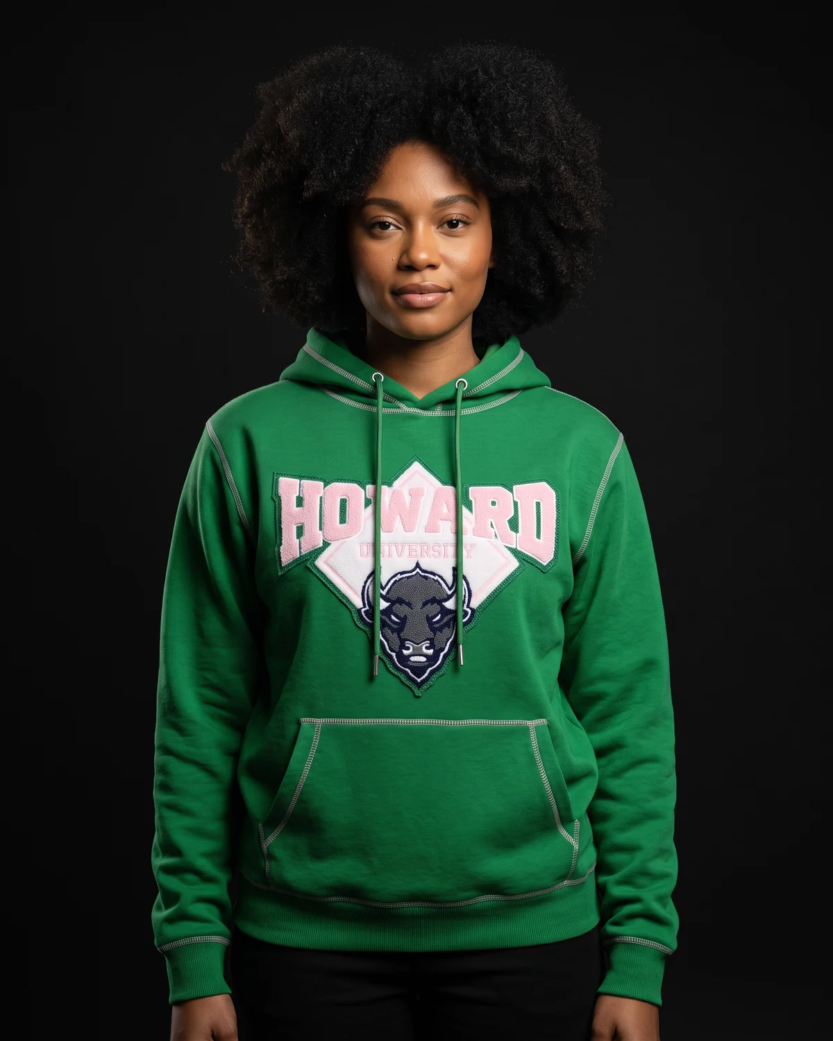 Model in a green university hoodie